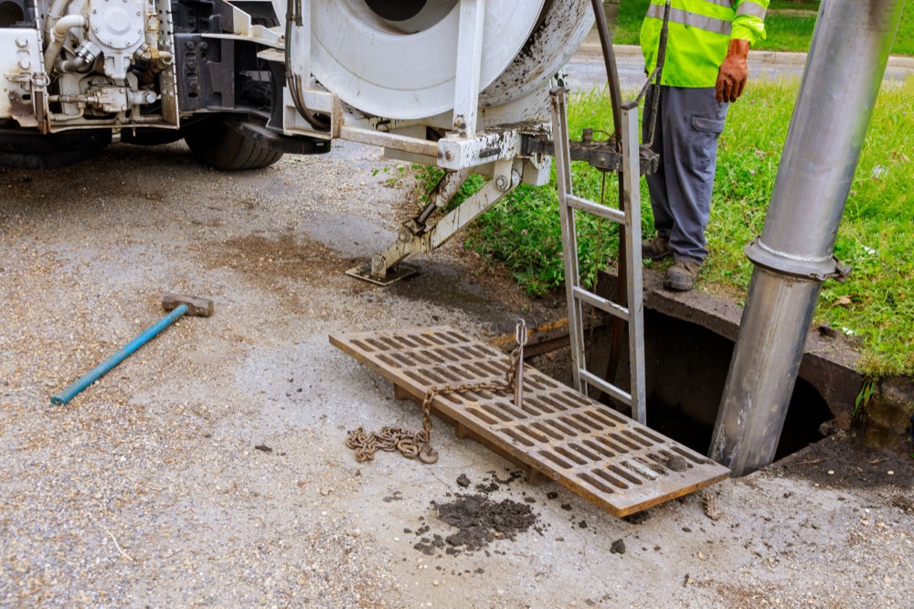 Drain unblocking equipment at an open drain